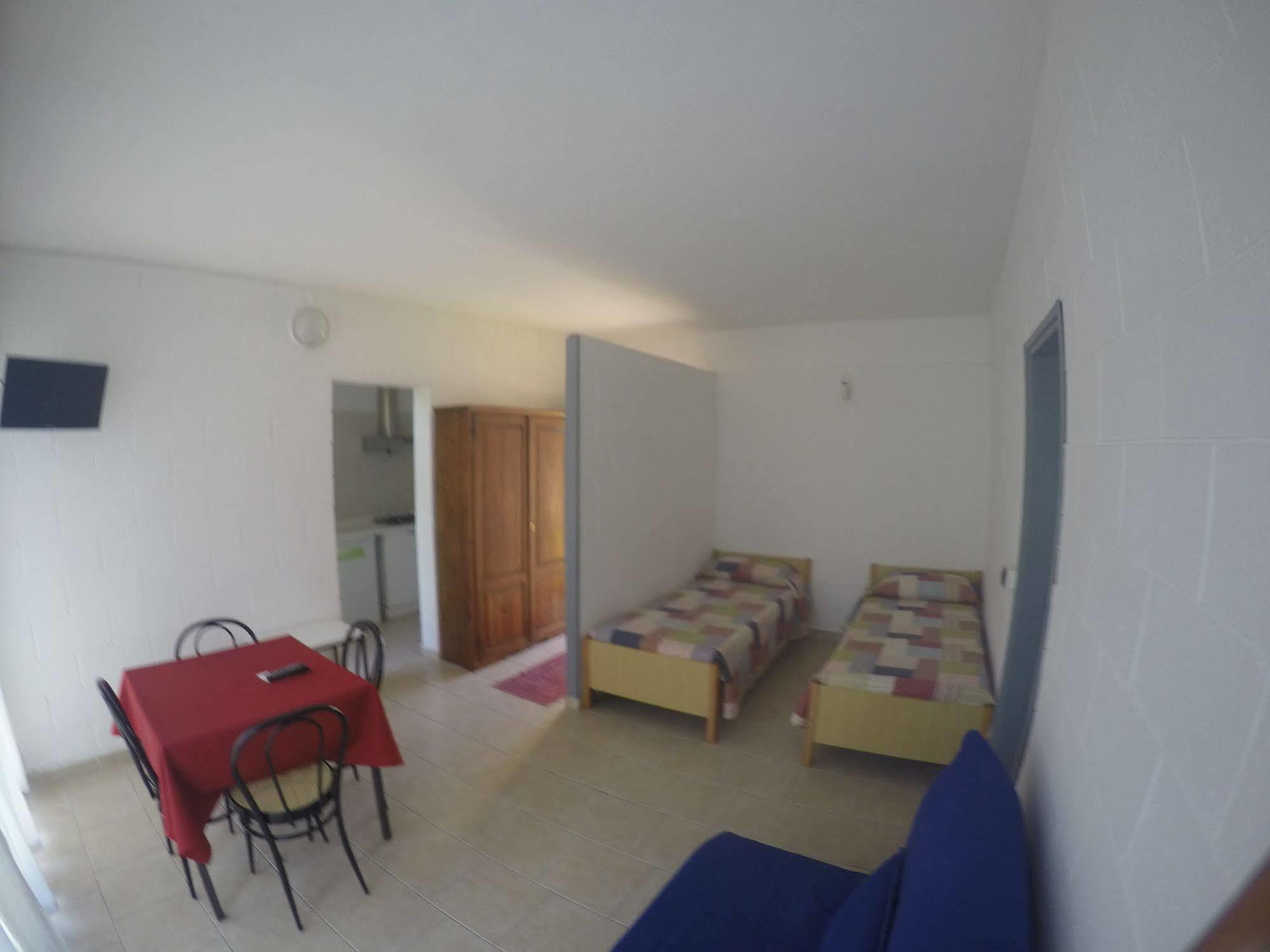 Camping Villaggio Paradiso โดมาโซ ภายนอก รูปภาพ